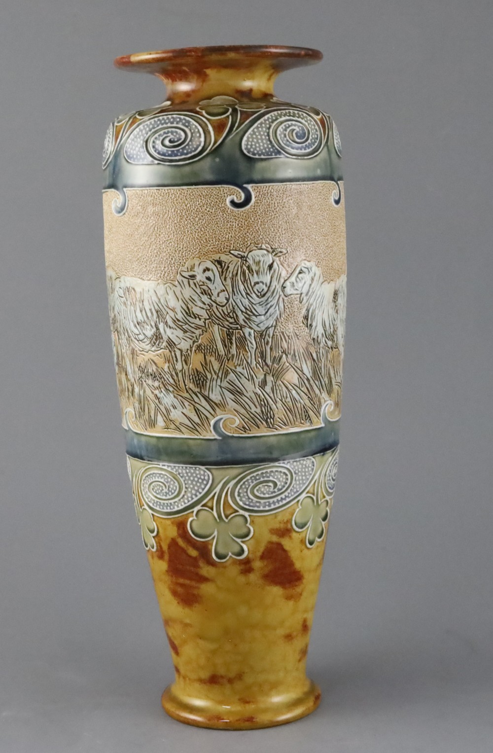 Hannah Barlow for Royal Doulton, a tall sheep sgraffito vase, c.1905, 36cm, rim restoration